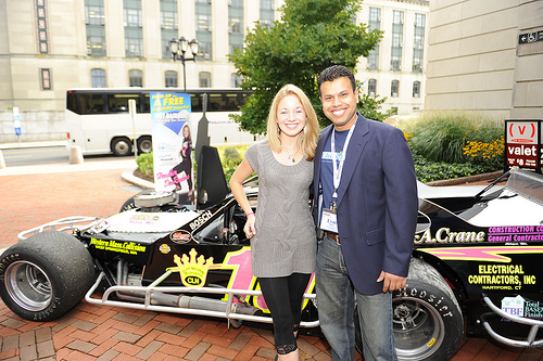 Heather and I posing in front of her race car Heather Rocher and Evan Islam